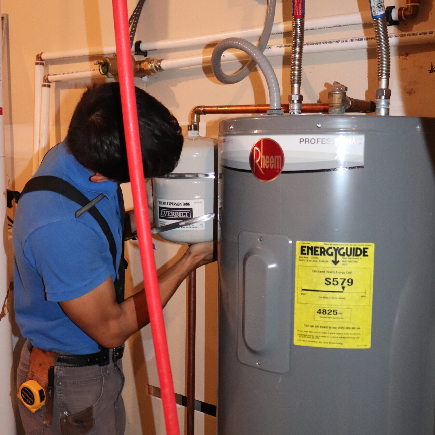 Master Plumber installing thermal expansion tank.